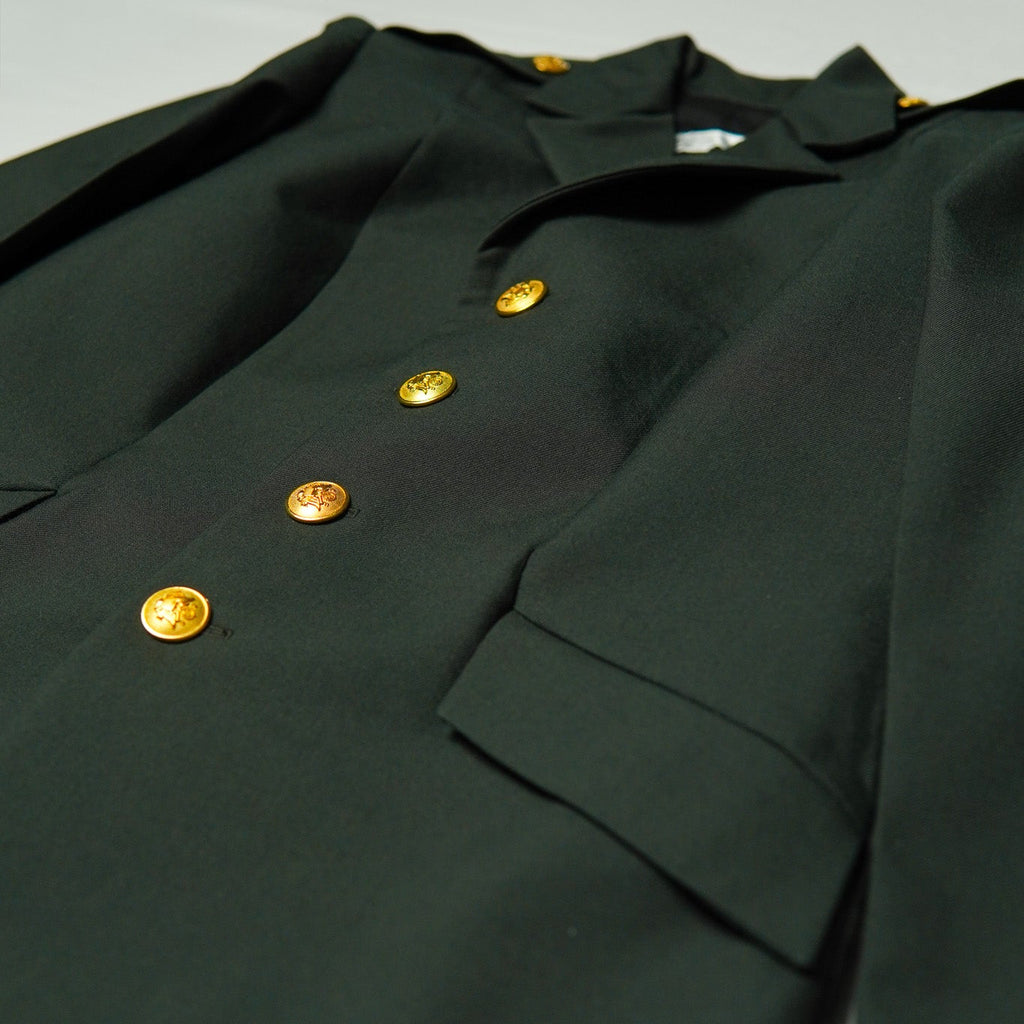 Dark green military-style jacket with gold buttons on a light gray background