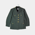 Green military-style jacket with gold buttons on a white background