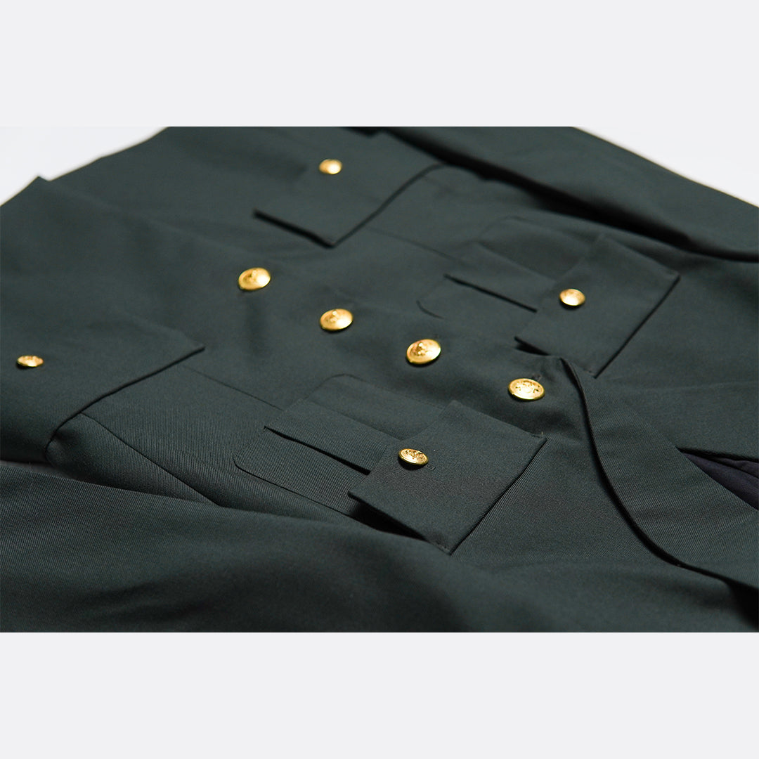 Close-up of a dark green military-style jacket with gold buttons on a white background